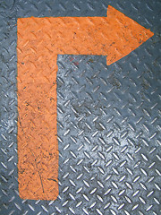 Image showing Grungy orange arrow