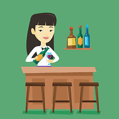 Image showing Bartender standing at the bar counter.