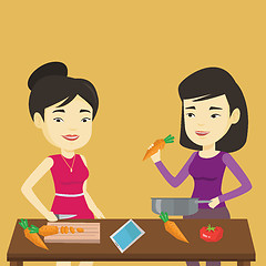 Image showing Women cooking healthy vegetable meal.