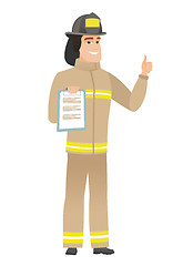 Image showing Firefighter with clipboard giving thumb up.