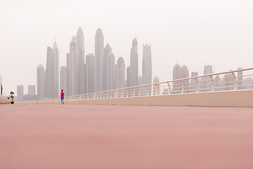 Image showing woman running on the promenade