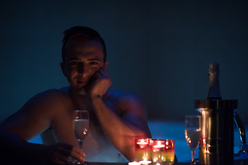 Image showing man relaxing in the jacuzzi