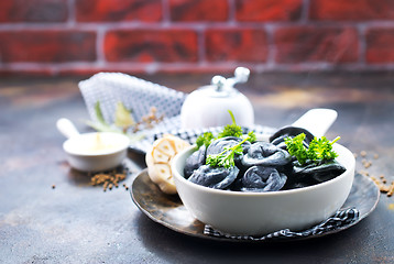 Image showing black dumplings