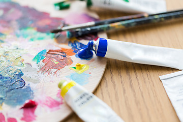 Image showing acrylic color or paint tubes and palette