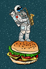 Image showing Astronaut plays saxophone on a Burger