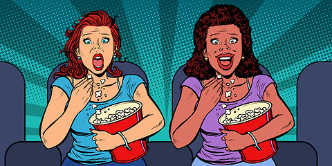 Image showing Two women react differently to the movie. laughs and fears