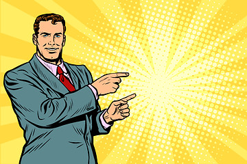 Image showing Businessman pointing finger at the side