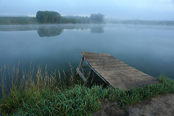 Image showing Wooden bridge leading