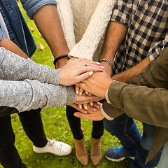 Image showing Friends joining hands