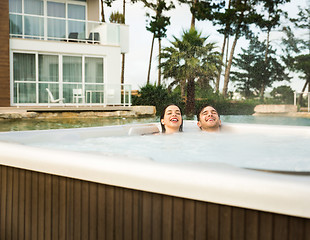 Image showing Young couple in a jacuzzi