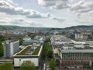 Image showing Stuttgart, Germany - May 24, 2013: Famous shopping promenade Koenigstrasse, between Koenigsbau and Schlossplatz square. On the right, the new art museum, a modern building with glass facade.