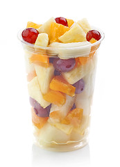 Image showing fresh fruit pieces salad in plastic cup