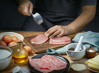 Image showing cook is preparing meat