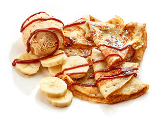 Image showing Crepes with banana and caramel icecream