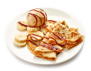 Image showing Crepes with banana and chocolate sauce