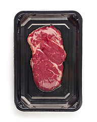 Image showing raw beef steak in vacoom package