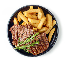 Image showing grilled beef steak and potatoes