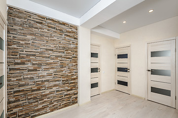 Image showing Modern apartments empty hall with room doors