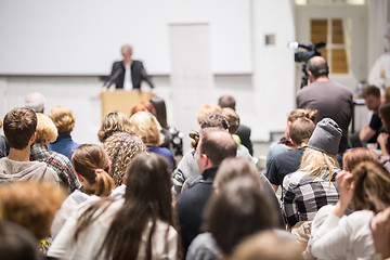 Image showing Business speaker giving a talk at business conference event.