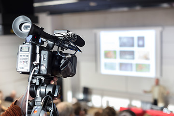 Image showing Television broadcasted press conference.