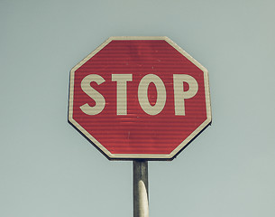 Image showing Vintage looking Stop sign over blue sky