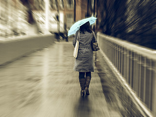 Image showing Vintage looking Girl in the rain