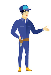 Image showing Mechanic with arm out in a welcoming gesture.