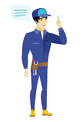 Image showing Young asian mechanic with speech bubble.