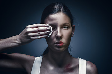 Image showing Close up portrait of a crying woman with bruised skin and black eyes