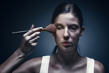 Image showing Close up portrait of a crying woman with bruised skin and black eyes