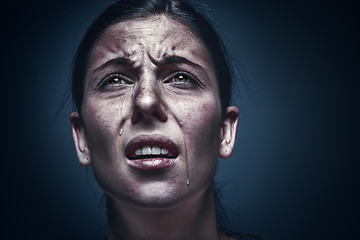 Image showing Close up portrait of a crying woman with bruised skin and black eyes