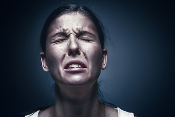 Image showing Close up portrait of a crying woman with bruised skin and black eyes