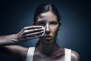 Image showing Close up portrait of a crying woman with bruised skin and black eyes