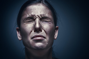 Image showing Close up portrait of a crying woman with bruised skin and black eyes