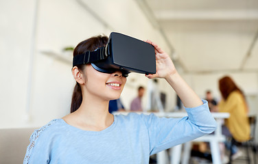 Image showing happy woman with virtual reality headset at office