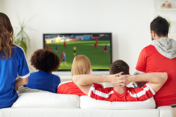 Image showing friends or soccer fans watching game on tv at home