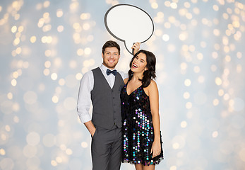 Image showing happy couple at party holding text bubble banner