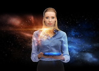 Image showing businesswoman with tablet pc and space hologram