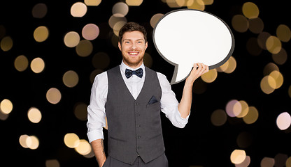 Image showing happy man in suit holding blank text bubble banner