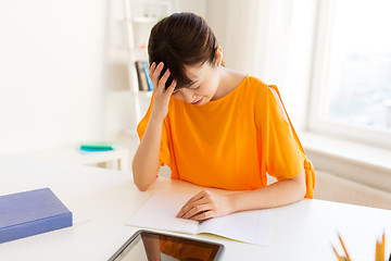 Image showing asian student girl with tablet pc learning at home