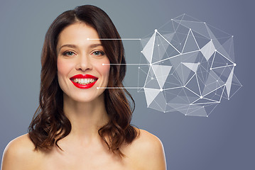 Image showing beautiful woman with low poly hologram on skin