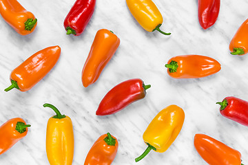 Image showing Colorful sweet peppers on marble background