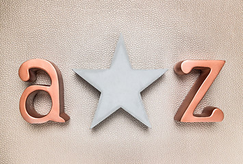 Image showing Concrete star and metal letters A and Z