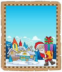 Image showing Santa Claus near village parchment 2