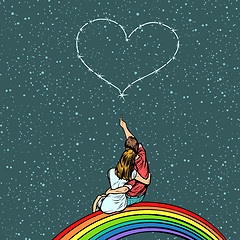 Image showing couple in love looks at the heart and sits on a rainbow