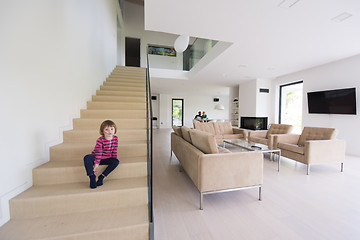 Image showing family with little girl enjoys in the modern living room