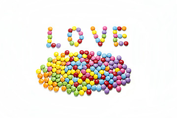 Image showing Word ''Love'' and bright colorful candy 