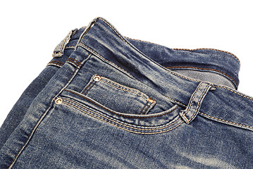 Image showing Fragment of dark blue jeans isolated on white