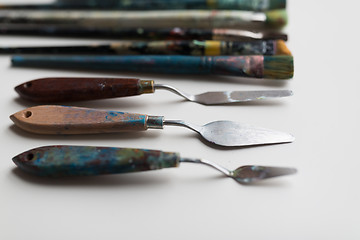 Image showing palette knives or painting spatulas and brushes