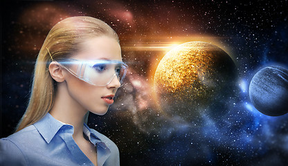 Image showing woman in virtual reality glasses over space